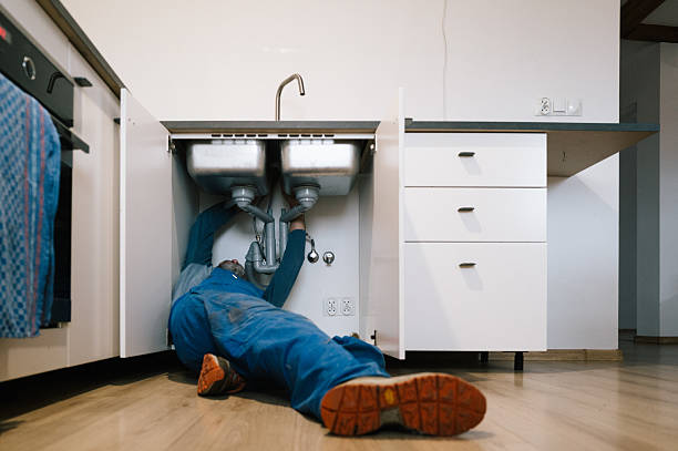 Professional Drain Cleaning technician working in Highland Park, IL